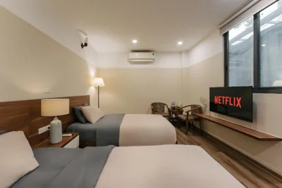 Habitación Standard con dos camas individuales - Planta baja — An Nguyen Boutique Hotel